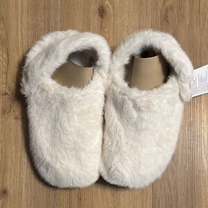 Crocs Plush Slip-On Slippers in Cream